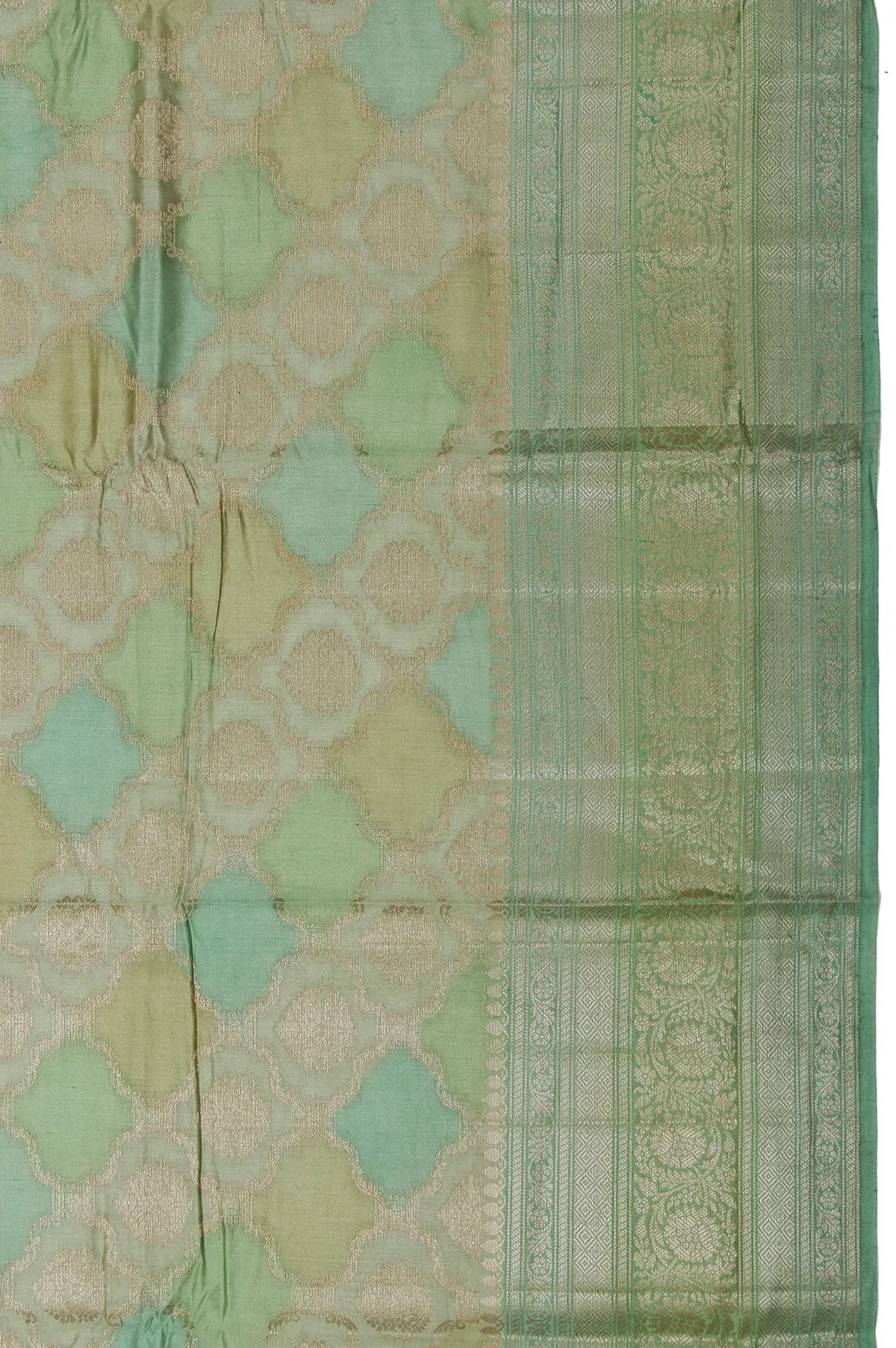 Green Chiniya Silk Saree with Gold Zari Leaf Design and Floral Creeper