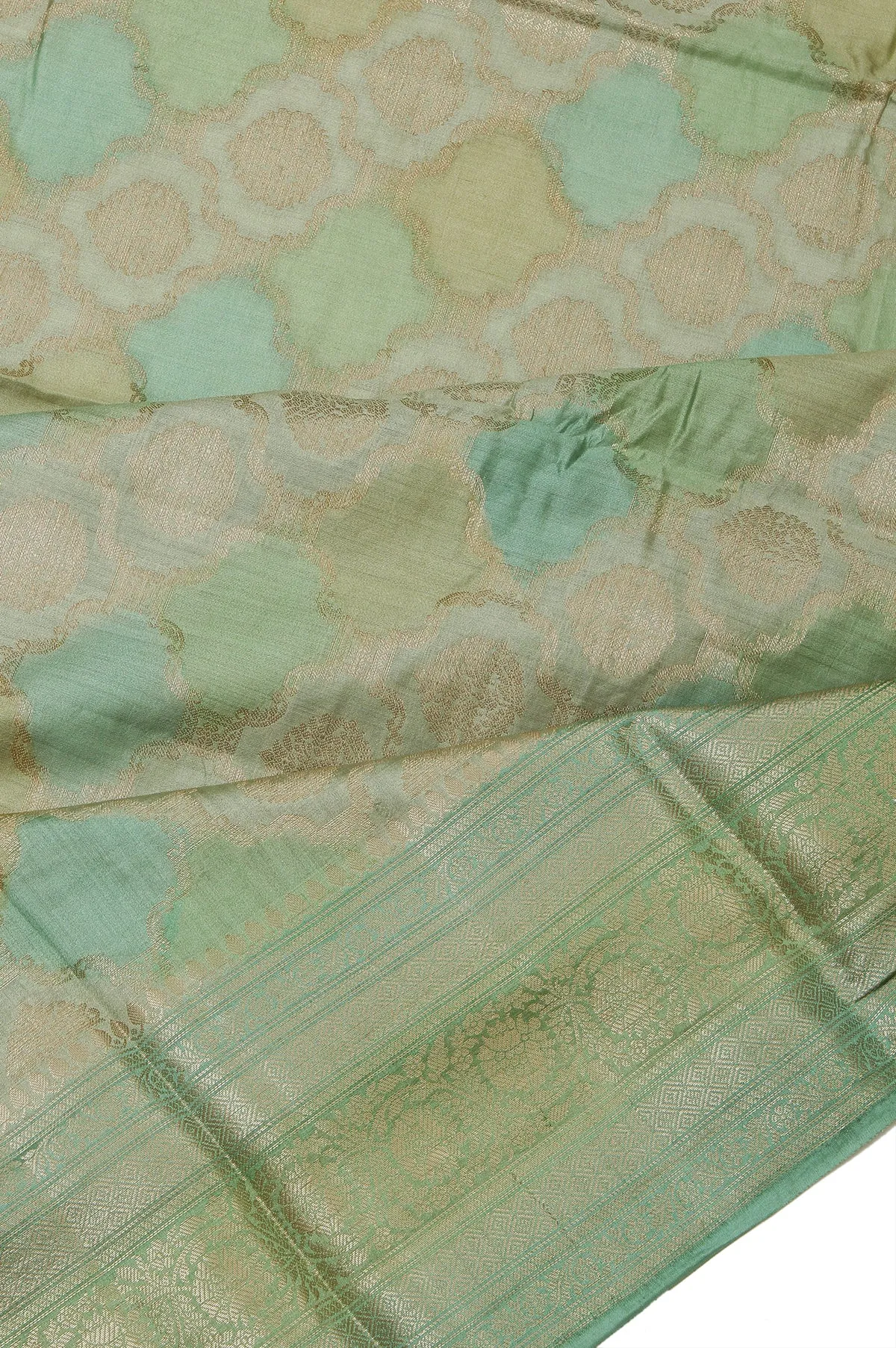 Green Chiniya Silk Saree with Gold Zari Leaf Design and Floral Creeper
